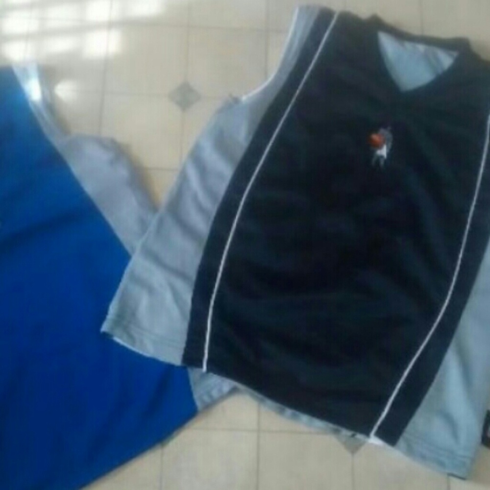 (2) And One reversible sleeveless tanks size 8